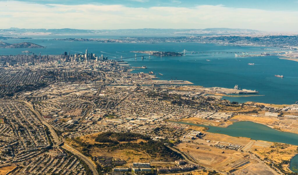 Aerial view of San Francisco wide area with bay and bridges
