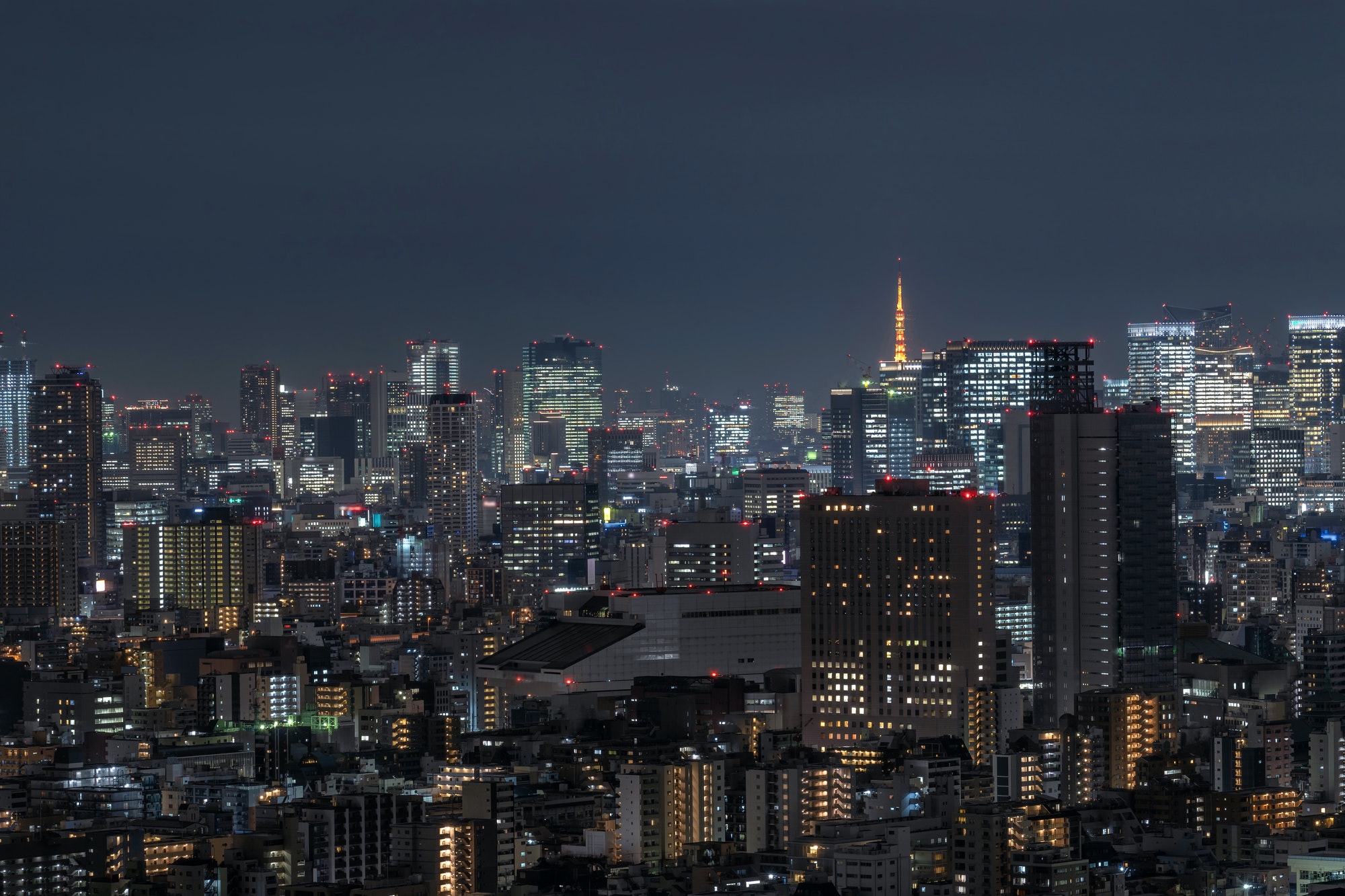 Tokyo cityscape which can see tokyo tower in far away, taking from tokyo sky tree east, Japan