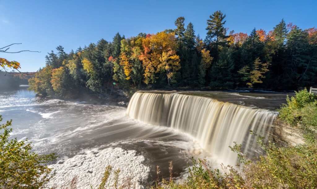 Upper Tahquamenon Falls during autumn season on a sunny day in Michigan, United States