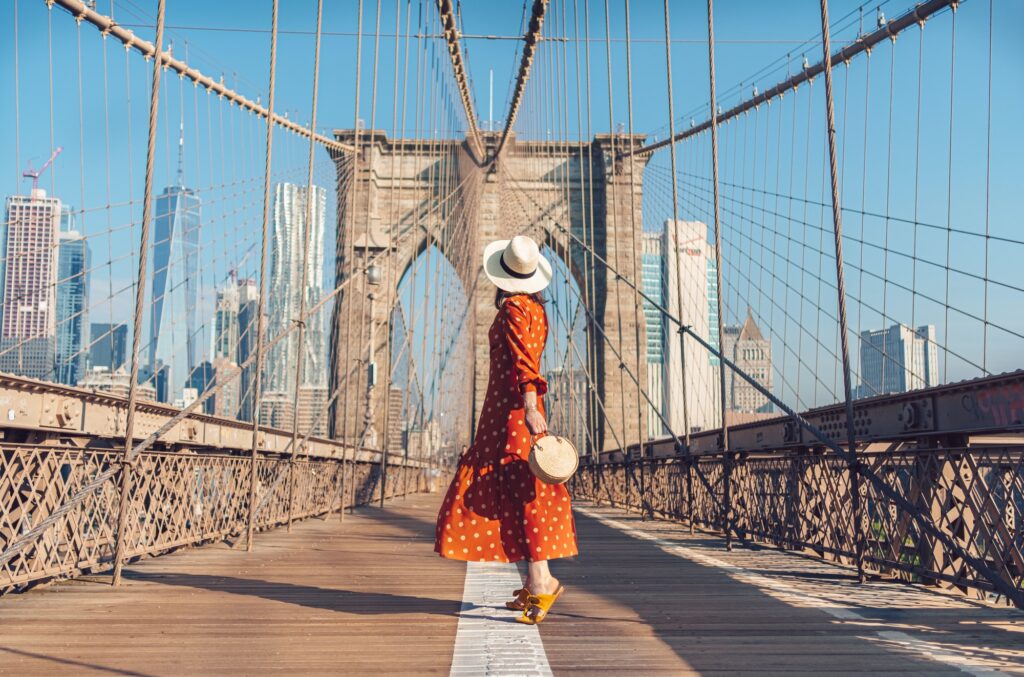 Young tourist on the Brooklyn Bridge